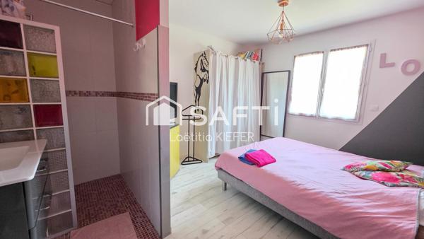 ENSEMBLE IMMOBILIER AVEC TERRAIN DE 10 700 M2