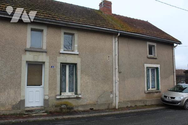 Maison avec nombreuses dépendances