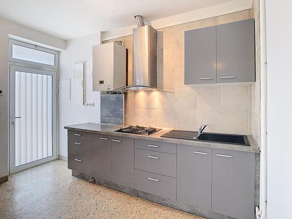 Maison de 91 m² avec jardin- divisée en 2 appartement loués