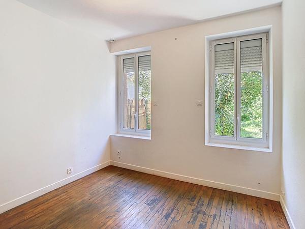 Maison de 91 m² avec jardin- divisée en 2 appartement loués