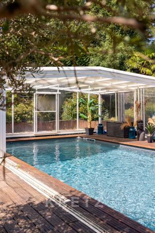 Maison de 196m2 au coeur d’un jardin arboré avec piscine.