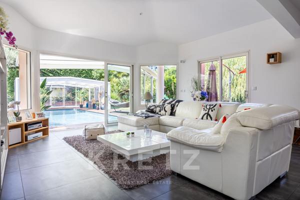 Maison de 196m2 au coeur d’un jardin arboré avec piscine.