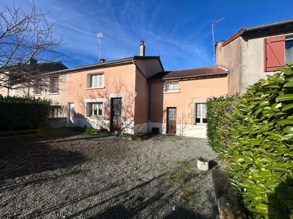 Maison de 75 m2 avec garage et jardin.
