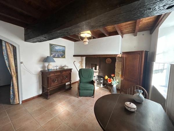 Maison de 75 m2 avec garage et jardin.