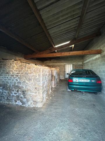 Maison de 75 m2 avec garage  et jardin.