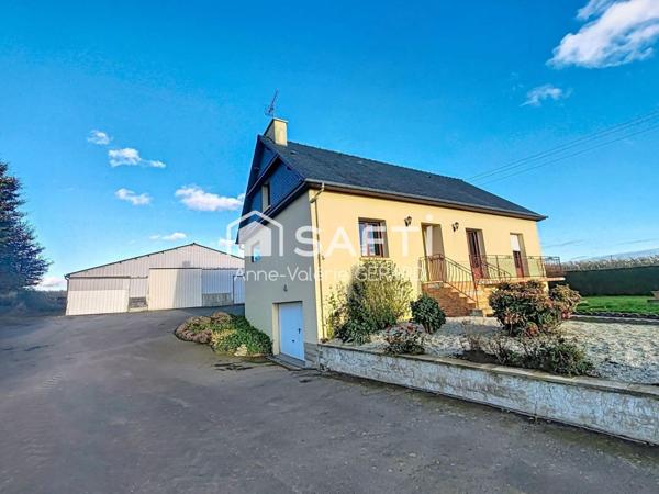 Pavillon 89m² avec grand bâtiment de stockage