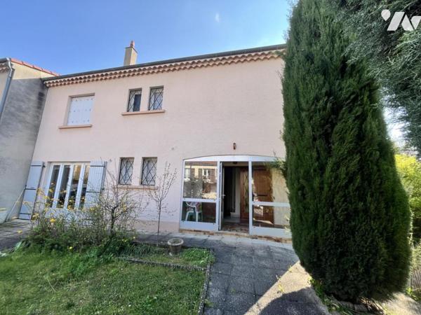 Maison à étage jumelée 
