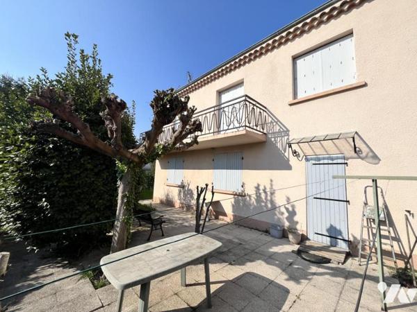 Maison à étage jumelée 
