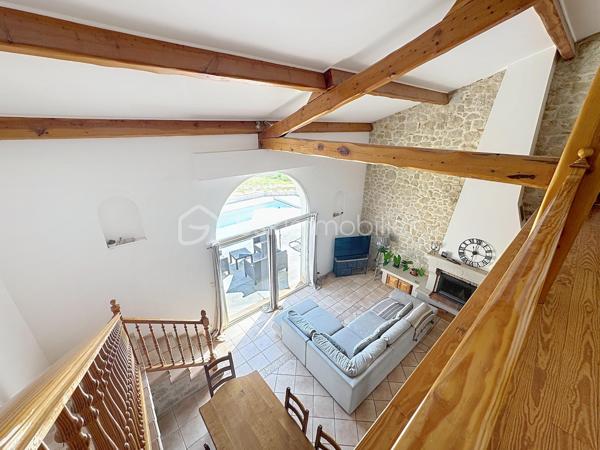 🏡 **Magnifique maison familiale de 180 m² avec piscine sur parcelle de 3 400 m²**

Dans un environnement calme et privilégié, venez découvrir cette superbe maison d'environ **180 m² habitables**, implantée sur une belle parcelle arborée de **3 400 m²**, offrant un cadre de vie paisible et sans aucun vis-à-vis.

Dès l'entrée, le charme opère grâce à ses magnifiques carreaux de ciment qui confèrent à la maison authenticité et caractère.
✨ **Au rez-de-chaussée :
* Une belle entrée ;
* Une cuisine indépendante aménagée et équipée ;
* Un cellier / buanderie ;
* Une pièce polyvalente pouvant servir de bureau, chambre d'amis ou salle de jeux ;
* Une magnifique pièce de vie baignée de lumière avec une belle hauteur sous plafond, un superbe mur en pierre et un insert, créant une atmosphère chaleureuse et conviviale ;
* Un accès direct à la terrasse et à la piscine ;
* Une belle suite parentale avec salle d'eau privative ;
* Un WC indépendant.

✨ **À l'étage :
* Trois belles chambres 
* Une grande salle de bain équipée d'une douche et d'une baignoire ;
* Un WC indépendant.

🚗 **Les dépendances :
* Un grand garage ;
* Une mezzanine aménagée au-dessus du garage offrant un espace supplémentaire de stockage, bureau ou atelier selon vos besoins.

🌴 **Les extérieurs :
* Magnifique terrain de 3 400 m² ;
* Piscine récente et son local, 
* Grande terrasse idéale pour les moments de détente ;
* Aucun vis-à-vis.

✅ **Les atouts :**
* Pompe à chaleur neuve ;
* Piscine neuve ;
* Double vitrage ;
* Beaux volumes et charme de l'ancien ;
* Environnement calme et recherché ;
* Quelques travaux de rafraîchissement et finitions de la plage de piscine à prévoir pour révéler tout le potentiel de cette belle propriété.
Une maison pleine de charme, idéale pour une famille à la recherche d'espace, de confort et de tranquillité.

📞 Contactez-moi dès aujourd'hui pour organiser une visite et découvrir tout son potentiel.