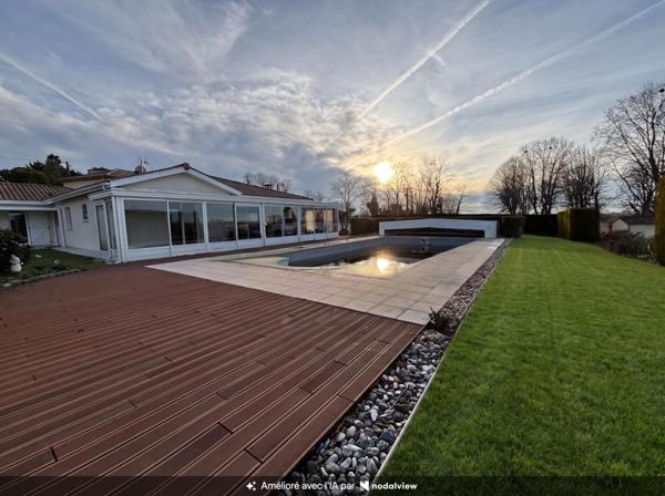 Maison de plain-pied familiale avec piscine double garage avec dépendance et cave