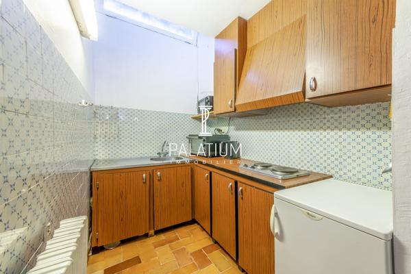 Maison de plain-pied avec jardin arboré et 3 appartements