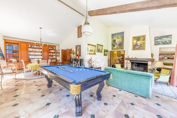 Maison de plain-pied avec jardin arboré et 3 appartements