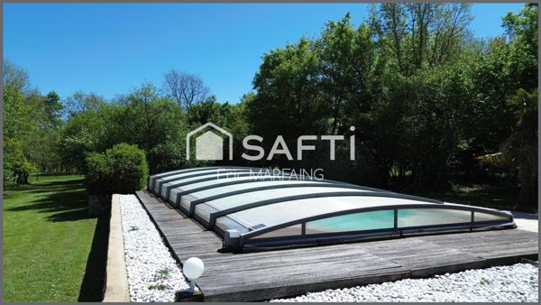 Maison de maître avec gîte et piscine dans grand parc