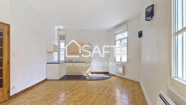 Immeuble de rapport de 189m² avec 2 appartements, un local commercial et une dépendance de 60m² sur 2 étages