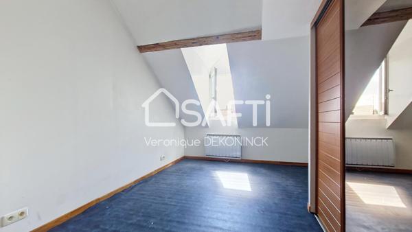 Immeuble de rapport de 189m² avec 2 appartements, un local commercial et une dépendance de 60m² sur 2 étages