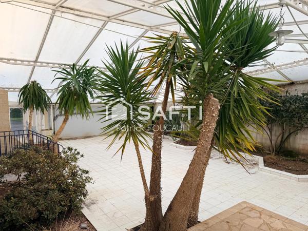 Appartement, Rez de jardin avec jardin d'hiver