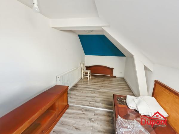 Maison individuelle avec 4 chambres, jardin et garage en sous-sol