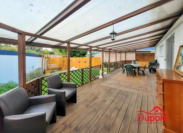 Maison individuelle avec 4 chambres, jardin et garage en sous-sol