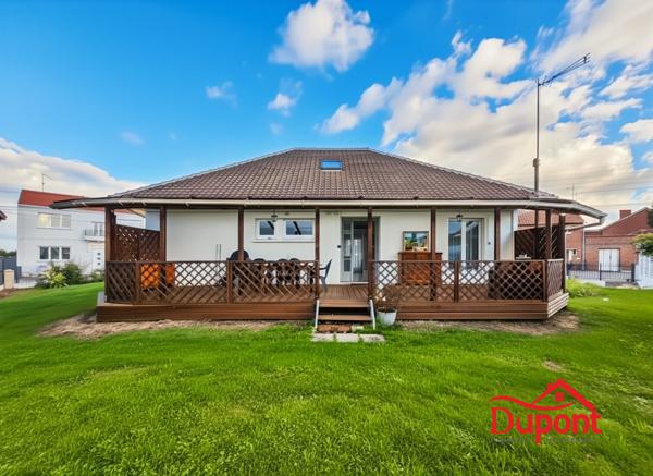 Maison individuelle avec 4 chambres, jardin et garage en sous-sol