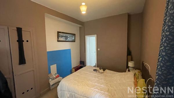 Volumes et caractere pour ce T4 en centre ville d Auray