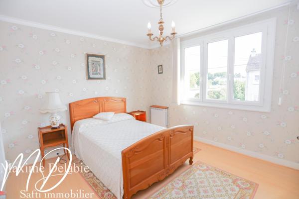 Maison avec jardin et garage – Quartier Prémartine