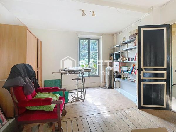 Grande maison familiale avec jardin arboré