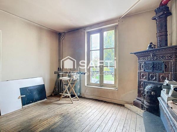 Grande maison familiale avec jardin arboré
