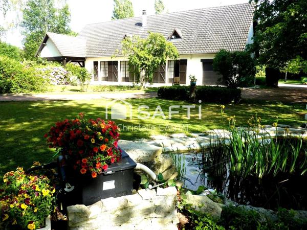 Maison 263 m², 7 pièces, garages, dépendances.