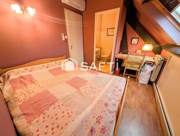 Maison 263 m², 7 pièces, garages, dépendances.