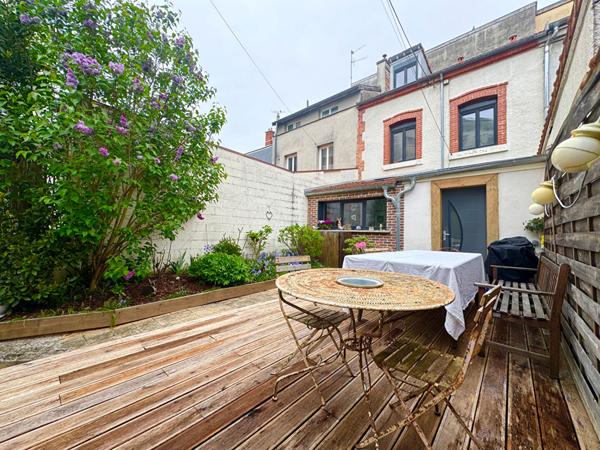 Maison proche de l'hyper centre avec extérieur