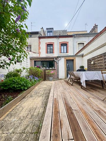 Maison proche de l'hyper centre avec extérieur