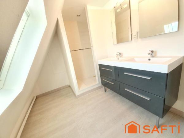 DUPLEX ATYPIQUE AVEC ASCENSEUR AU CŒUR DE LISIEUX