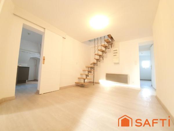 DUPLEX ATYPIQUE AVEC ASCENSEUR AU CŒUR DE LISIEUX
