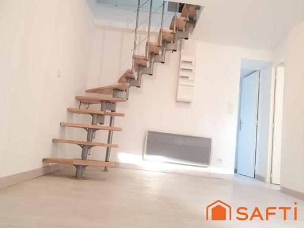 DUPLEX ATYPIQUE AVEC ASCENSEUR AU CŒUR DE LISIEUX