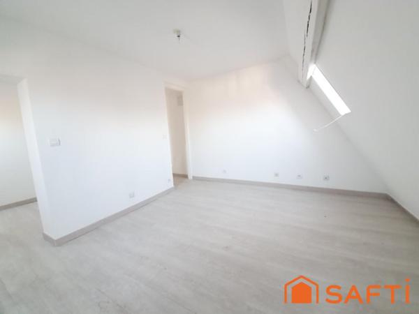 DUPLEX ATYPIQUE AVEC ASCENSEUR AU CŒUR DE LISIEUX