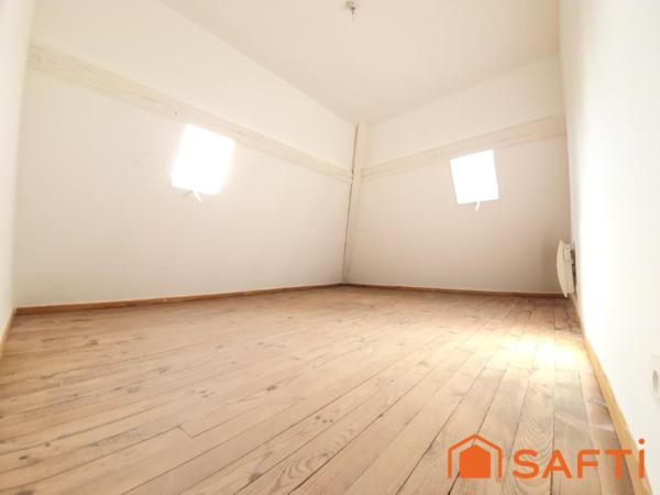 DUPLEX ATYPIQUE AVEC ASCENSEUR AU CŒUR DE LISIEUX