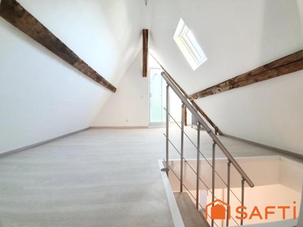 DUPLEX ATYPIQUE AVEC ASCENSEUR AU CŒUR DE LISIEUX