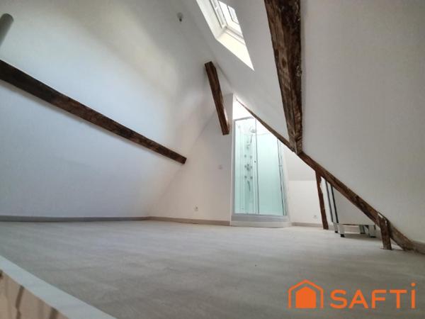 DUPLEX ATYPIQUE AVEC ASCENSEUR AU CŒUR DE LISIEUX