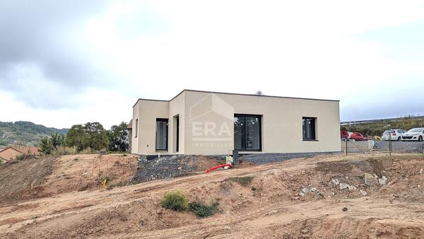 Maison de plain-pied, toit plat, 2 chambres 76.40 m2, carport, terrasse sur terrain 400 m2