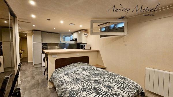 Appartement à vendre à AIX LES BAINS (73) composé de 3 studios, d'une salle commune et accès à la piscine.