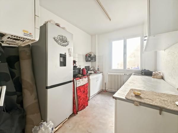 Parking + appartement + appartement + immeuble + appartement