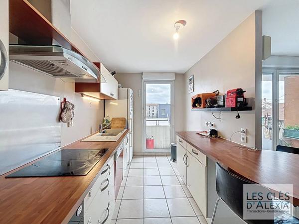 Charmant T4 ,92m2 avec garage et Balcon