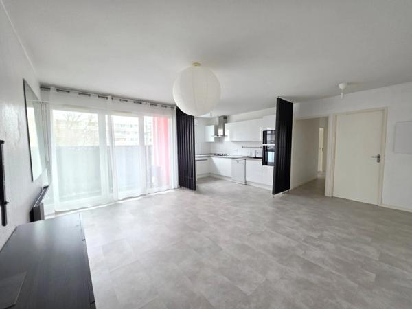 Appartement T3 en résidence sécurisée avec balcon et place de parking privative