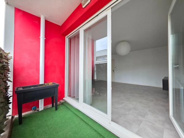 Appartement T3 en résidence sécurisée avec balcon et place de parking privative