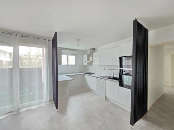 Appartement T3 en résidence sécurisée avec balcon et place de parking privative