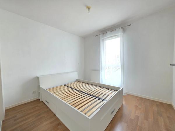 Appartement T3 en résidence sécurisée avec balcon et place de parking privative