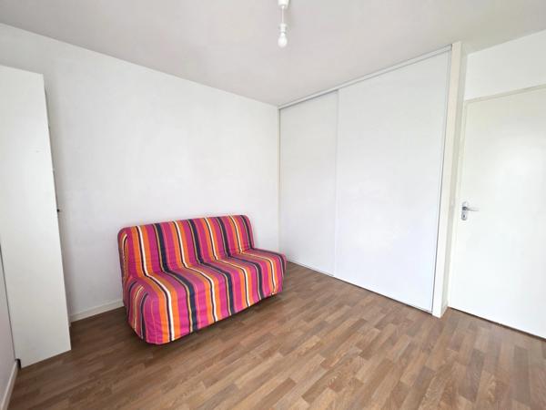 Appartement T3 en résidence sécurisée avec balcon et place de parking privative
