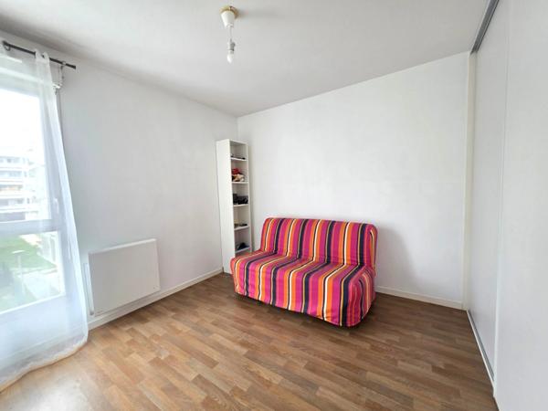 Appartement T3 en résidence sécurisée avec balcon et place de parking privative
