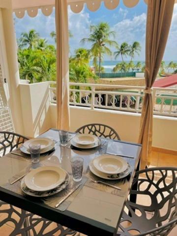 EN EXCLUSIVITE - SAINTE-ANNE – STUDIO PREMIÈRE LIGNE – VUE MER & PISCINE