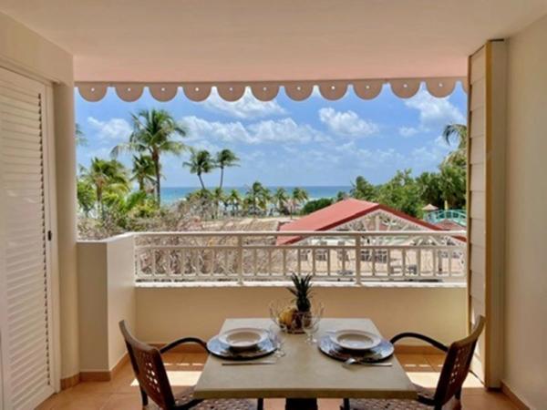 EN EXCLUSIVITE - SAINTE-ANNE – STUDIO PREMIÈRE LIGNE – VUE MER & PISCINE